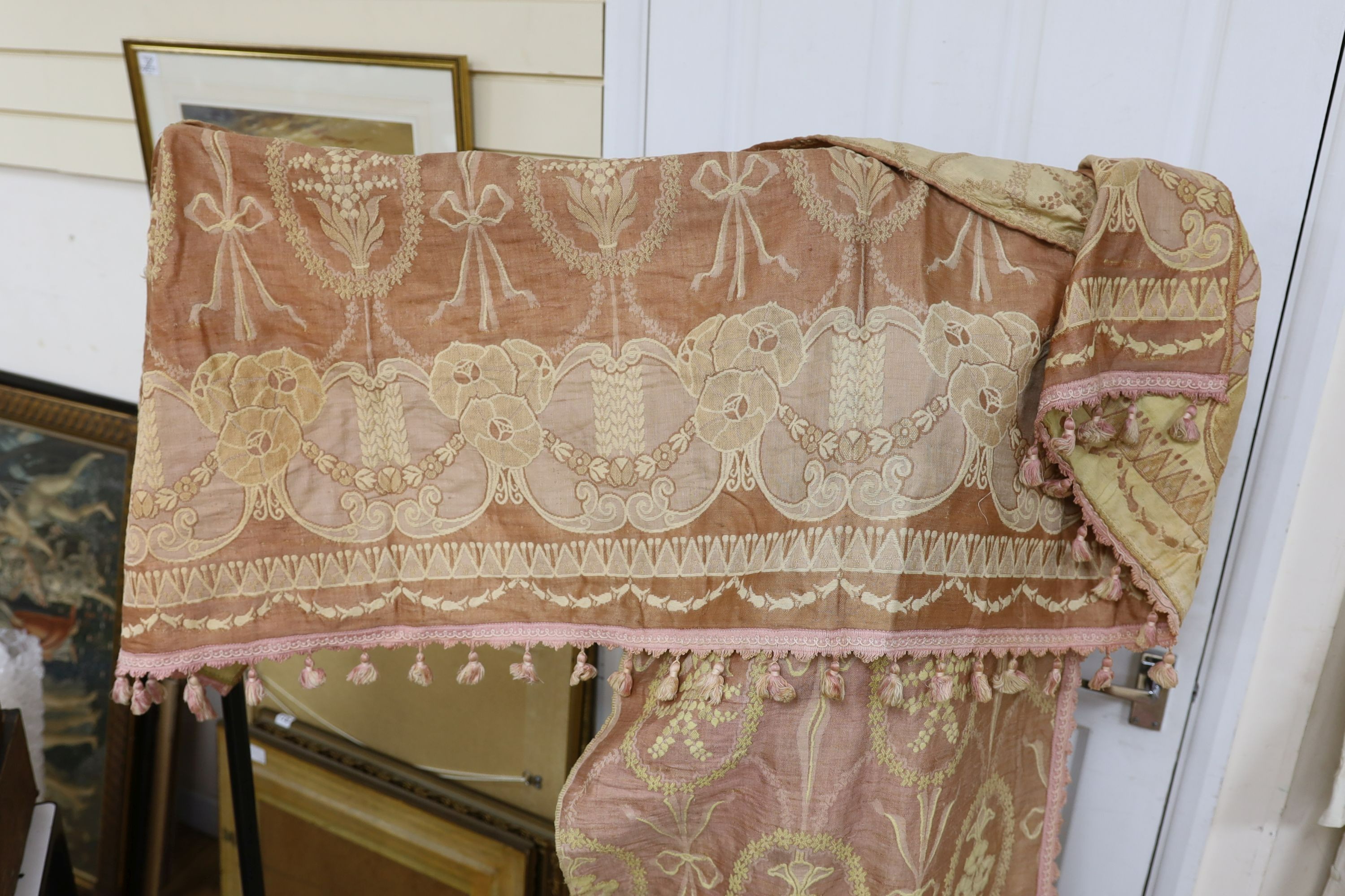 An unusual early 20th century hammock and pink brocade curtains